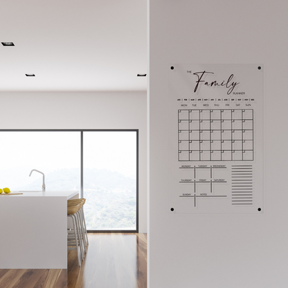 Mock-up of acrylic wall planner with frameless design displayed in a modern kitchen setting