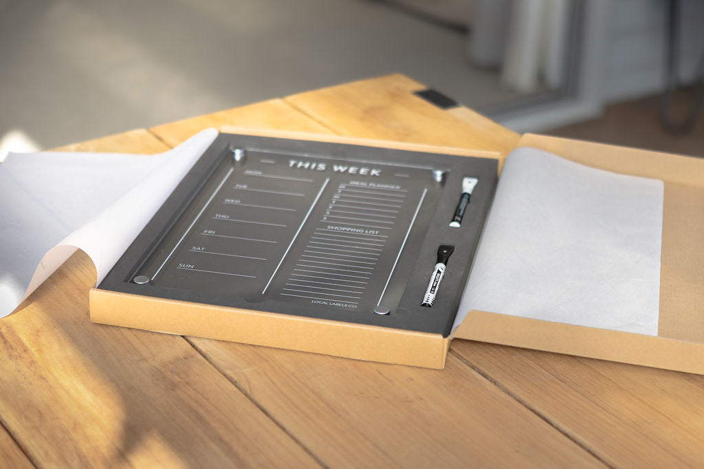 Luxury acrylic meal planner set with fine-tip pens on a table in New Zealand, perfect for stylish weekly organisation